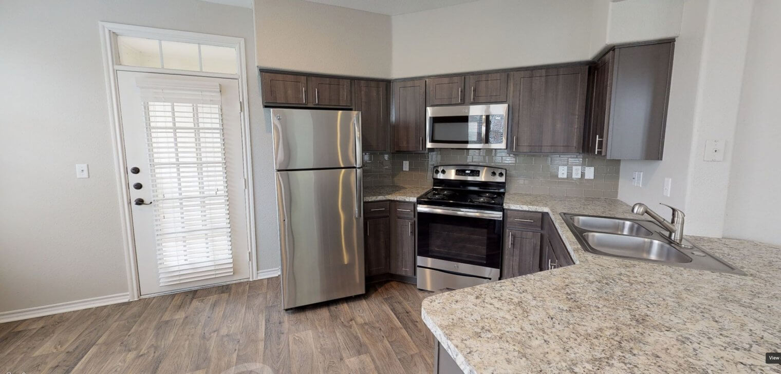 kitchen at mcdermott place luxury apartments in plano tx